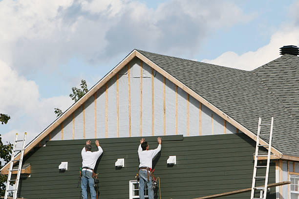 Professional Siding Contractor technician working in Smithfield, NC